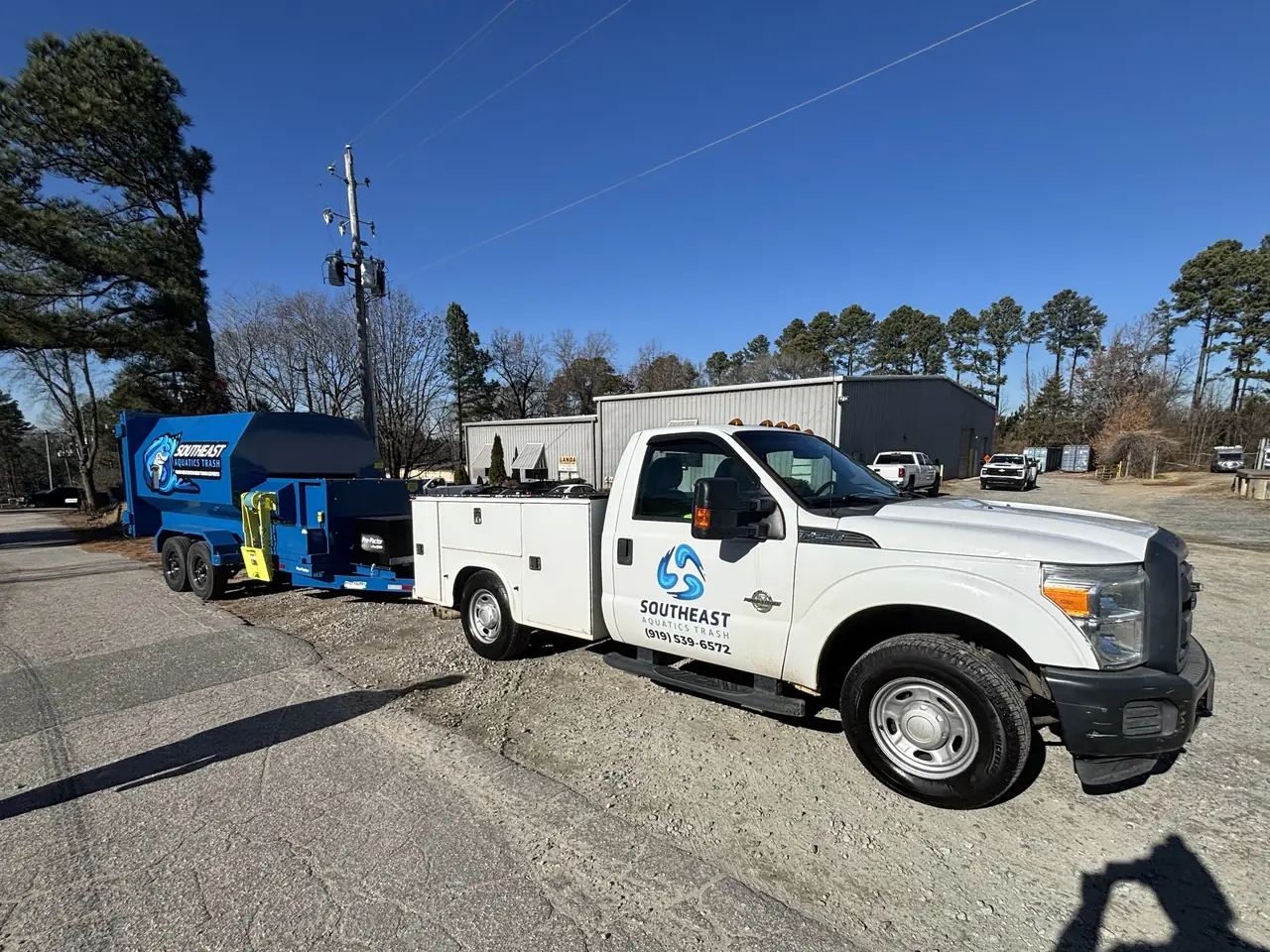 Southeast Aquatics Trash truck and compactor trailer serving the Triangle